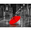 Roter Regenschirm im Regen